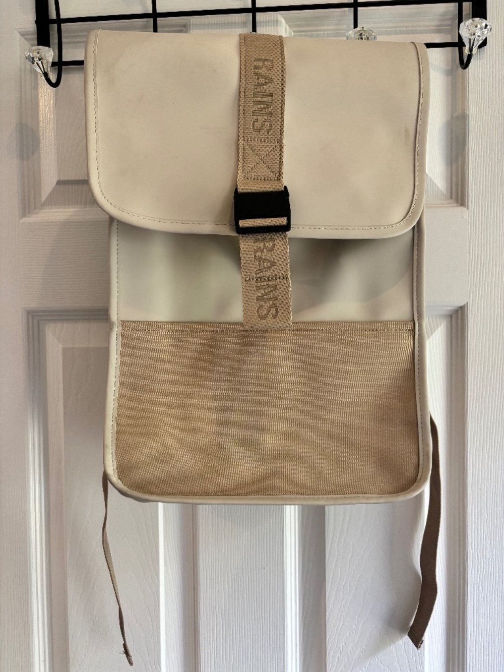 Rains off-white/cream commuter backpack